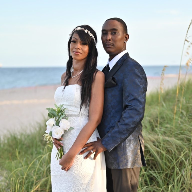 Wedding couple just married & celebrating by Iris Ramil wedding officiant in Pinecrest A new family celebrating together after their wedding officiated by Iris Ramil from Wedding Day Romance